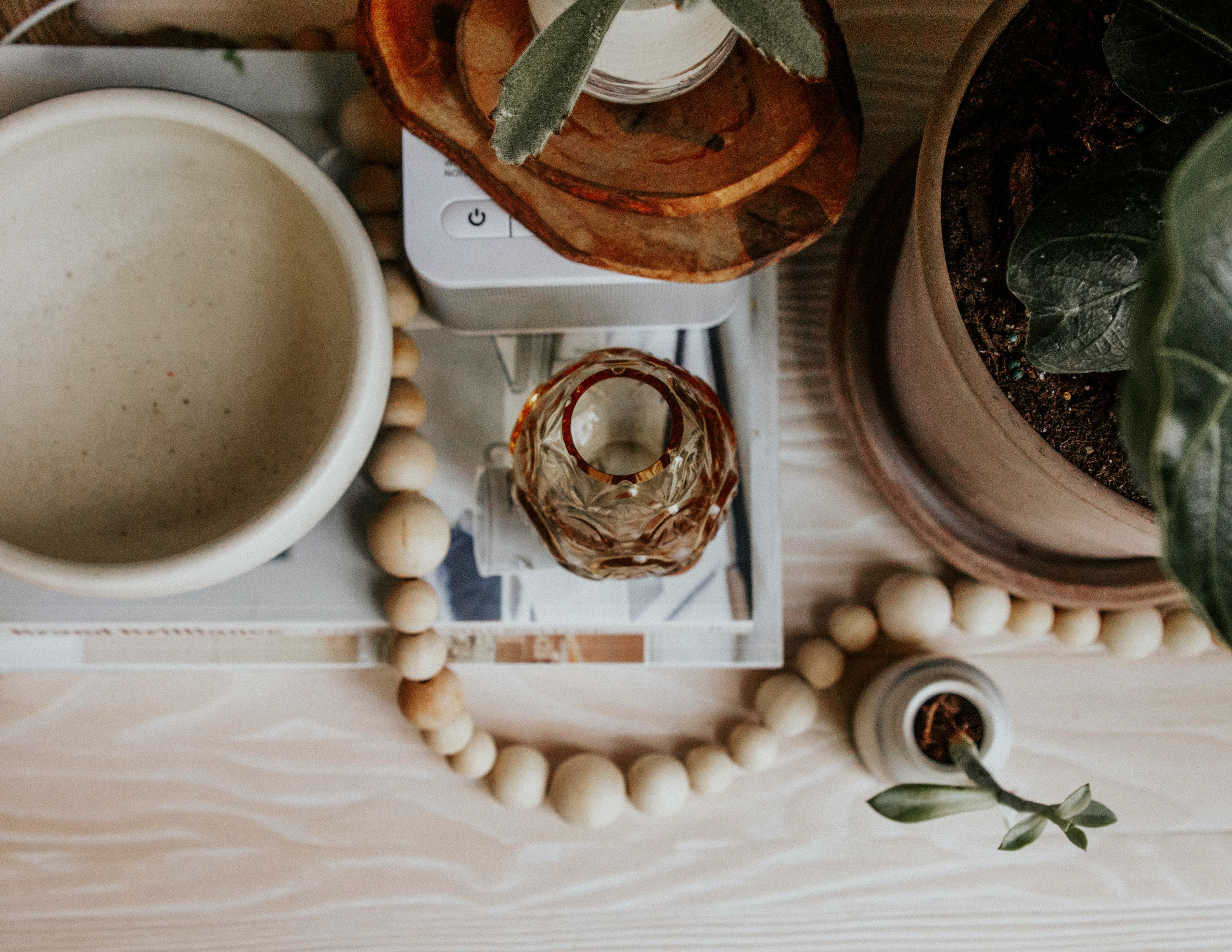 brown wooden tray with white round medication pill